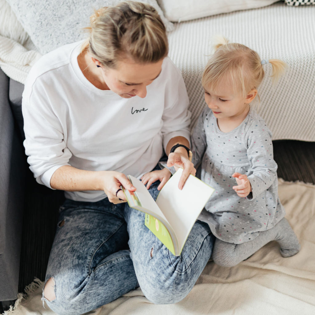 mom and toddler reading
